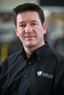 A headshot of Cavalier Tool's President and Owner Brian Bendig. Recent Recipient of The Business Excellence Awards Large Company of The Year Award